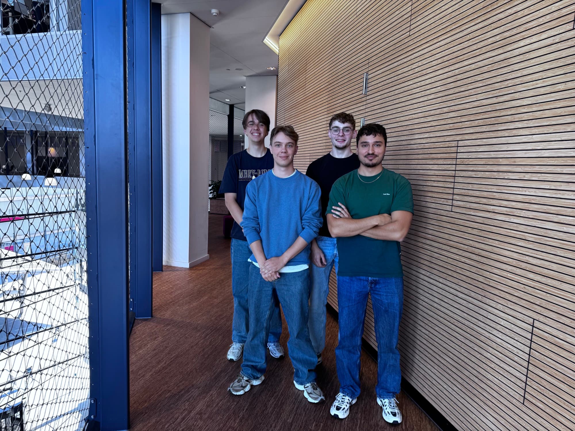 Het team van FoxxWare: vier mensen naast elkaar